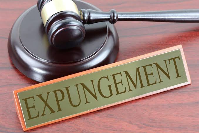 Gavel and a nameplate reading Expungement, representing record expungement
